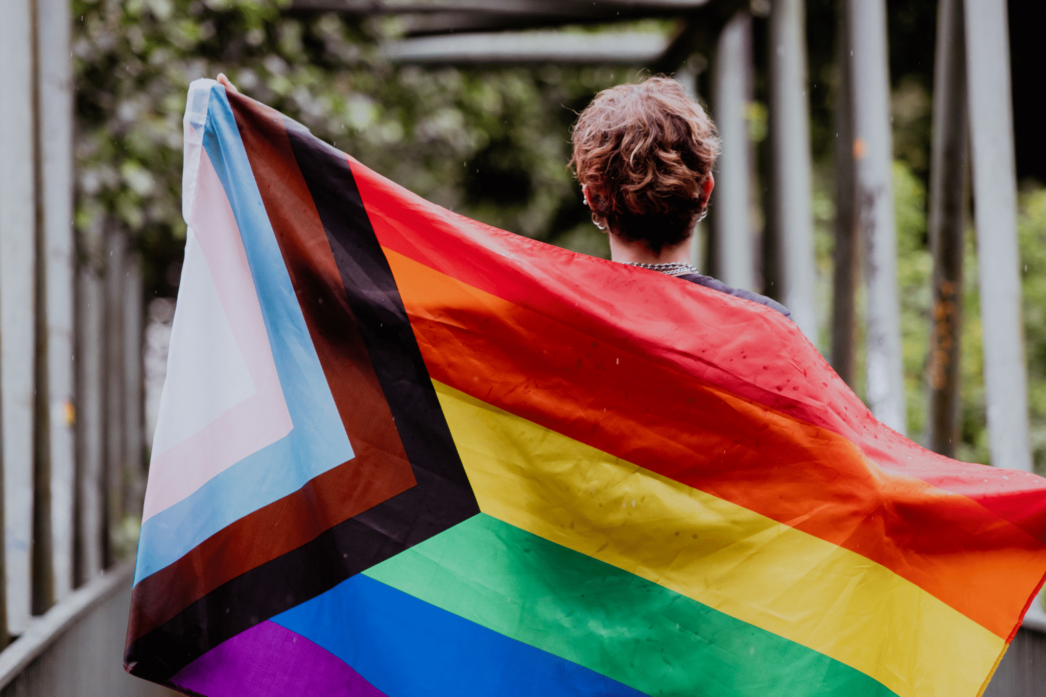 Toledo Center - LGBTQ Blog - young people with lgbtq flags